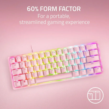 RGB 60% compact gaming keyboard on pink background, portable minimalist setup Byte Style