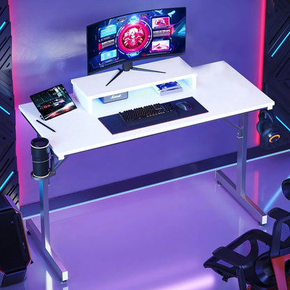 Modern white gaming desk with curved monitor, mechanical keyboard, mouse, tablet, headphones, and ambient purple lighting
