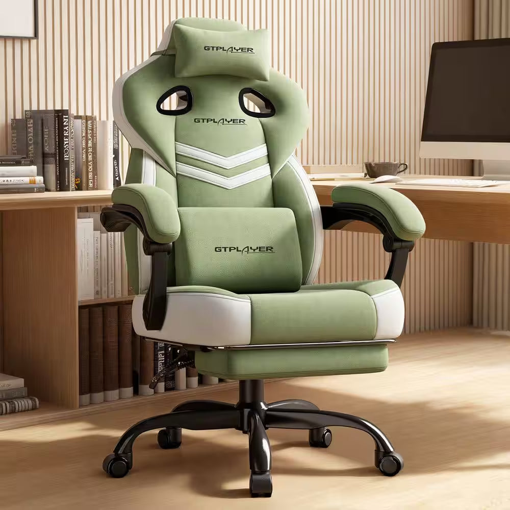 Green and white GTPLAYER gaming chair with lumbar support, positioned at a desk setup for gamers.