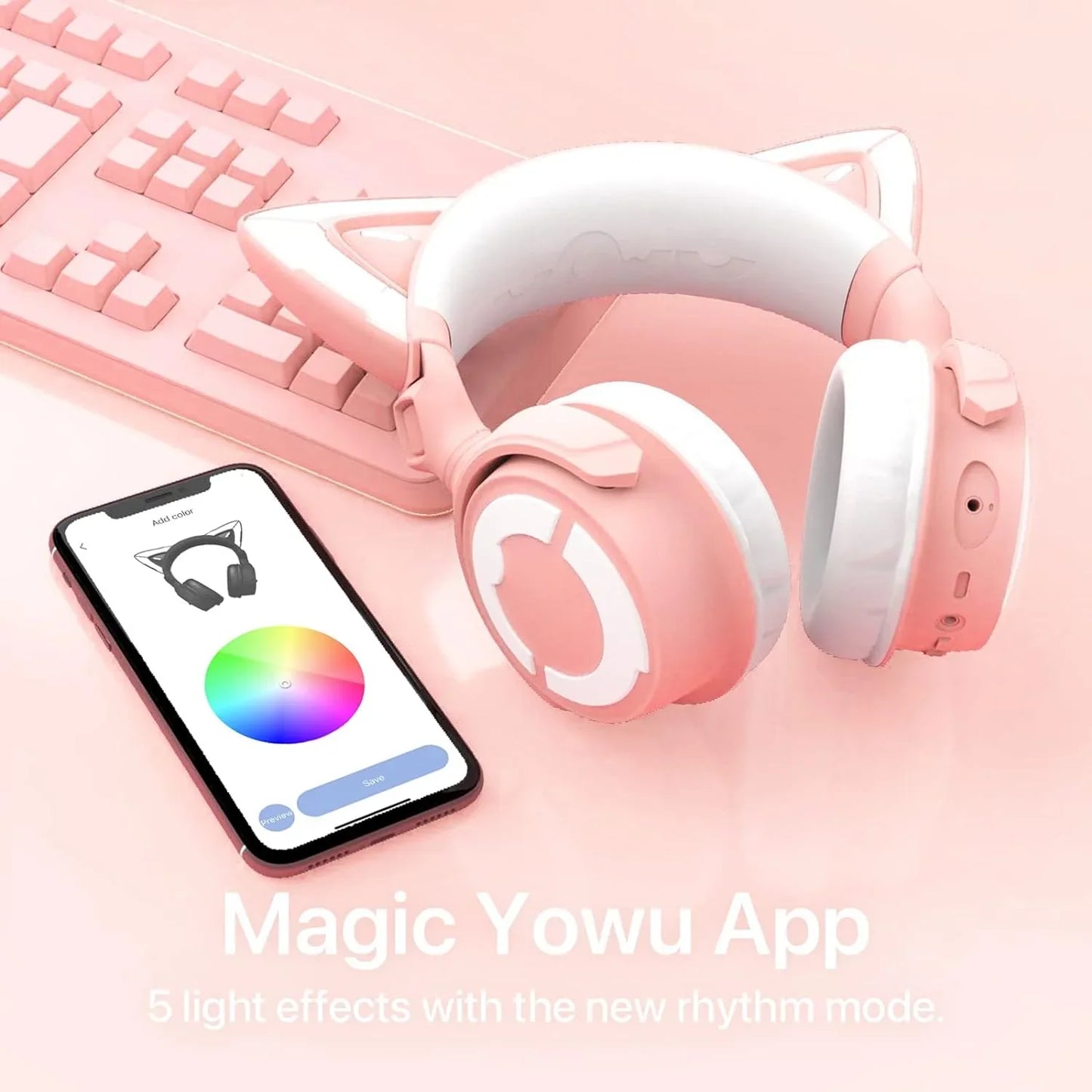 Pink cat ear gaming headphones with customizable RGB lighting controlled by Magic Yowu app on smartphone, pink keyboard