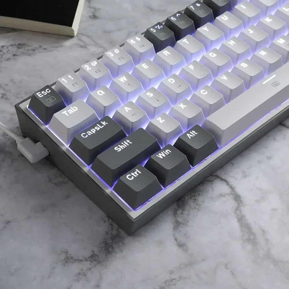 RGB backlit mechanical gaming keyboard with gray and white keycaps on a marble desk