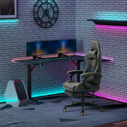 Modern gaming setup with ergonomic black gaming chair, dual curved monitors on black desk, RGB lighting, and gaming PC
