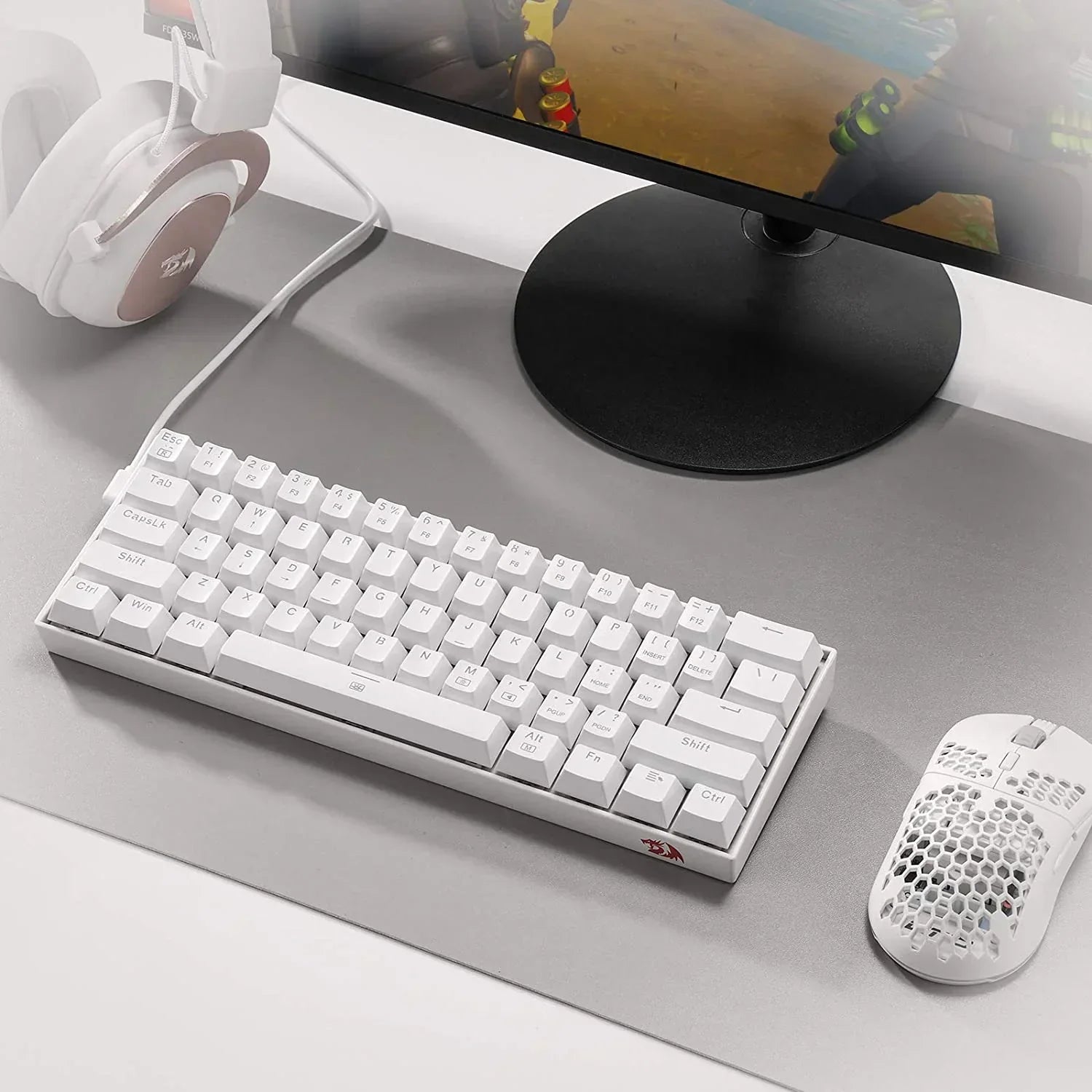 White gaming keyboard, mouse, and headset on modern desk setup with monitor, Byte Style