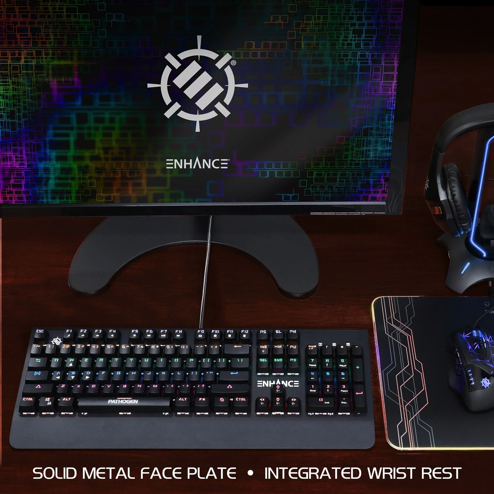 RGB gaming keyboard, mouse, and headset setup on wooden desk with monitor, Byte Style gear