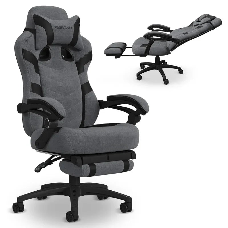 Gray gaming chair with lumbar support and recline feature, perfect for long gaming sessions.