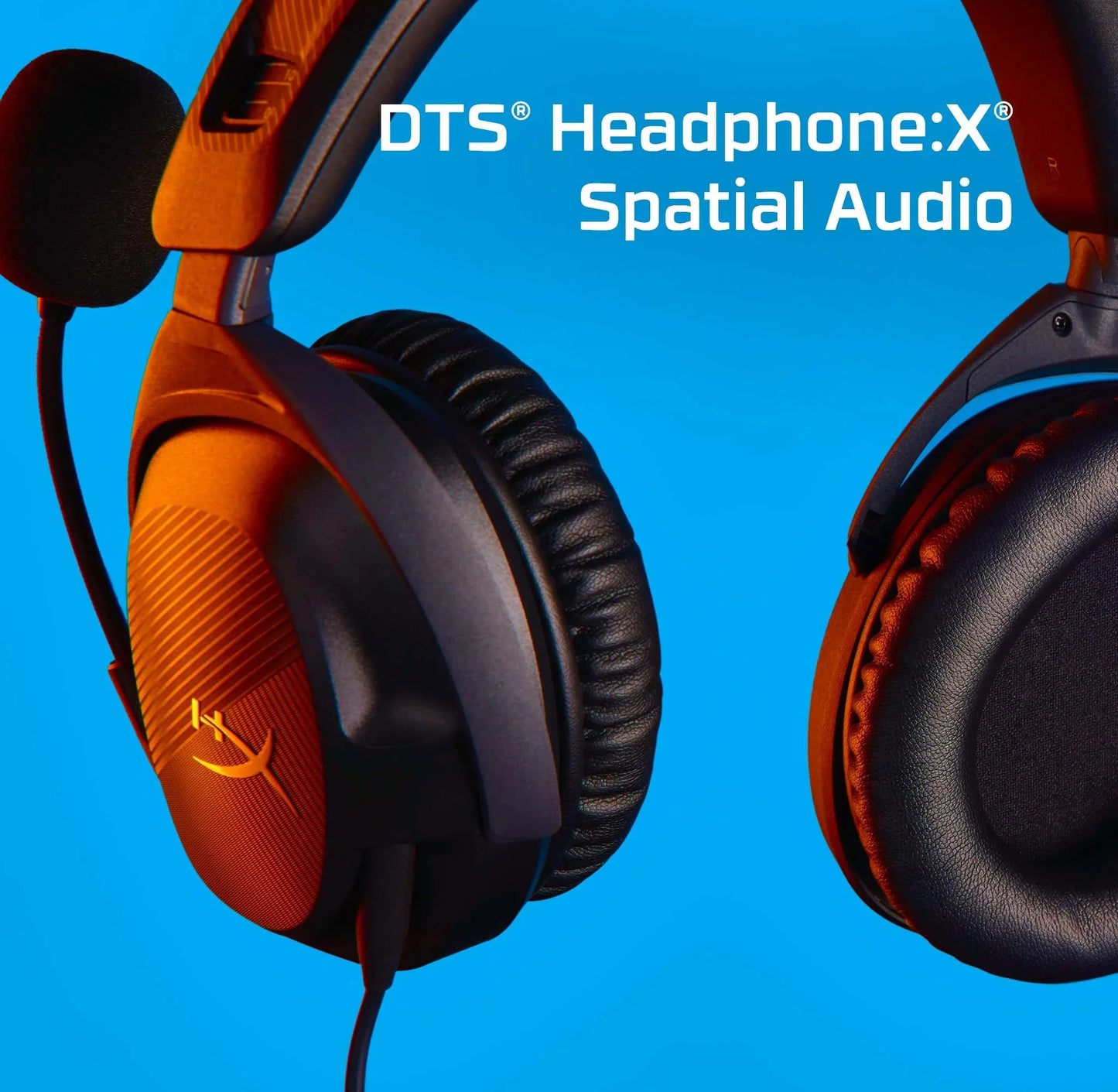 Black and orange HyperX gaming headphones with DTS Headphone:X spatial audio on bright blue background