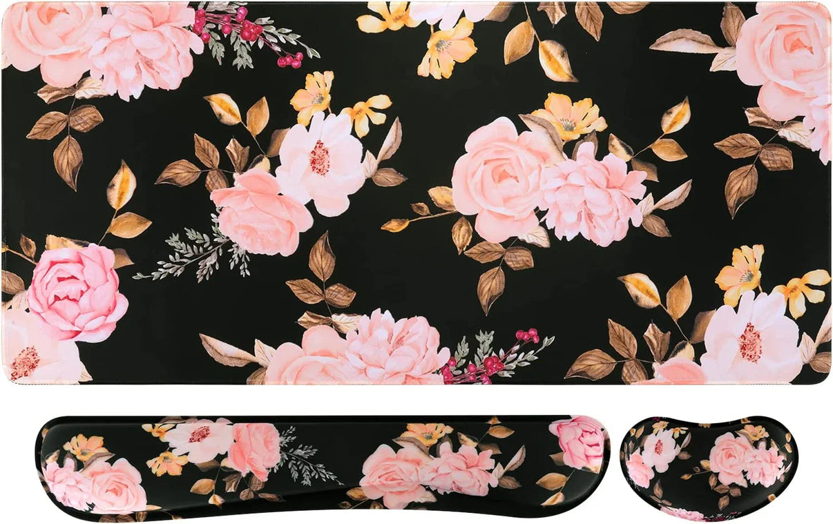 Floral gaming desk mat set with pink roses and brown leaves on black background, includes wrist rests