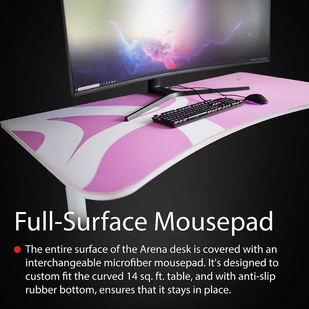 Curved Arena desk with full-surface pink and white microfiber mousepad, keyboard, and mouse setup
