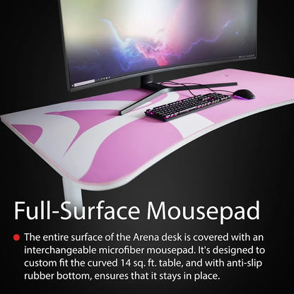 Curved Arena desk with full-surface pink and white microfiber mousepad, keyboard, and mouse setup