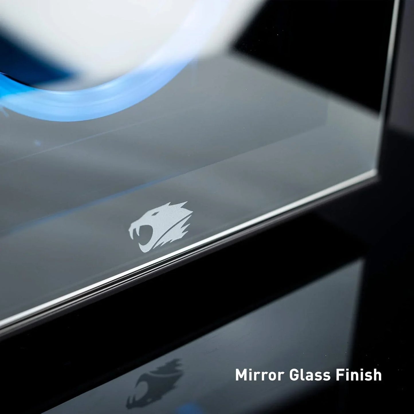 Close-up of gaming PC case with mirror glass finish and roaring lion logo