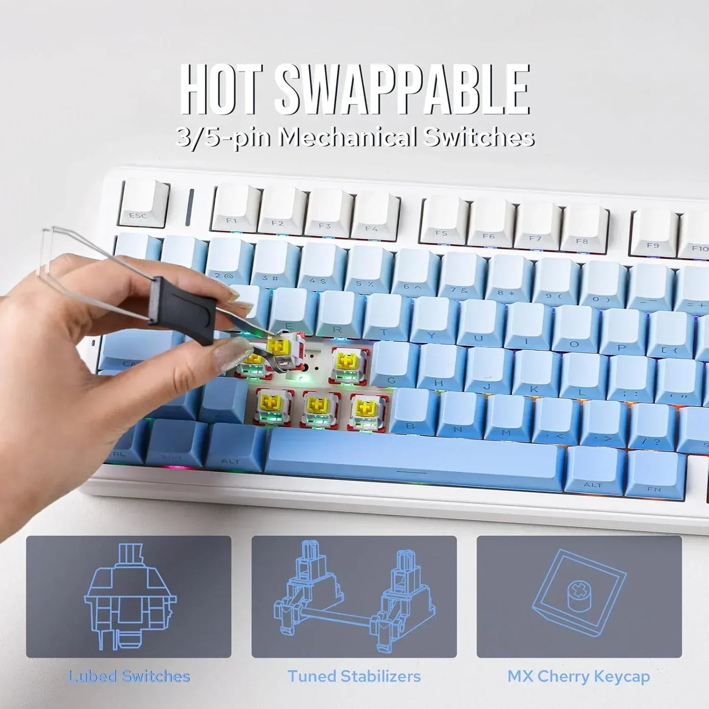 Hand swaps mechanical switch on blue and white hot-swappable gaming keyboard, Byte Style gear