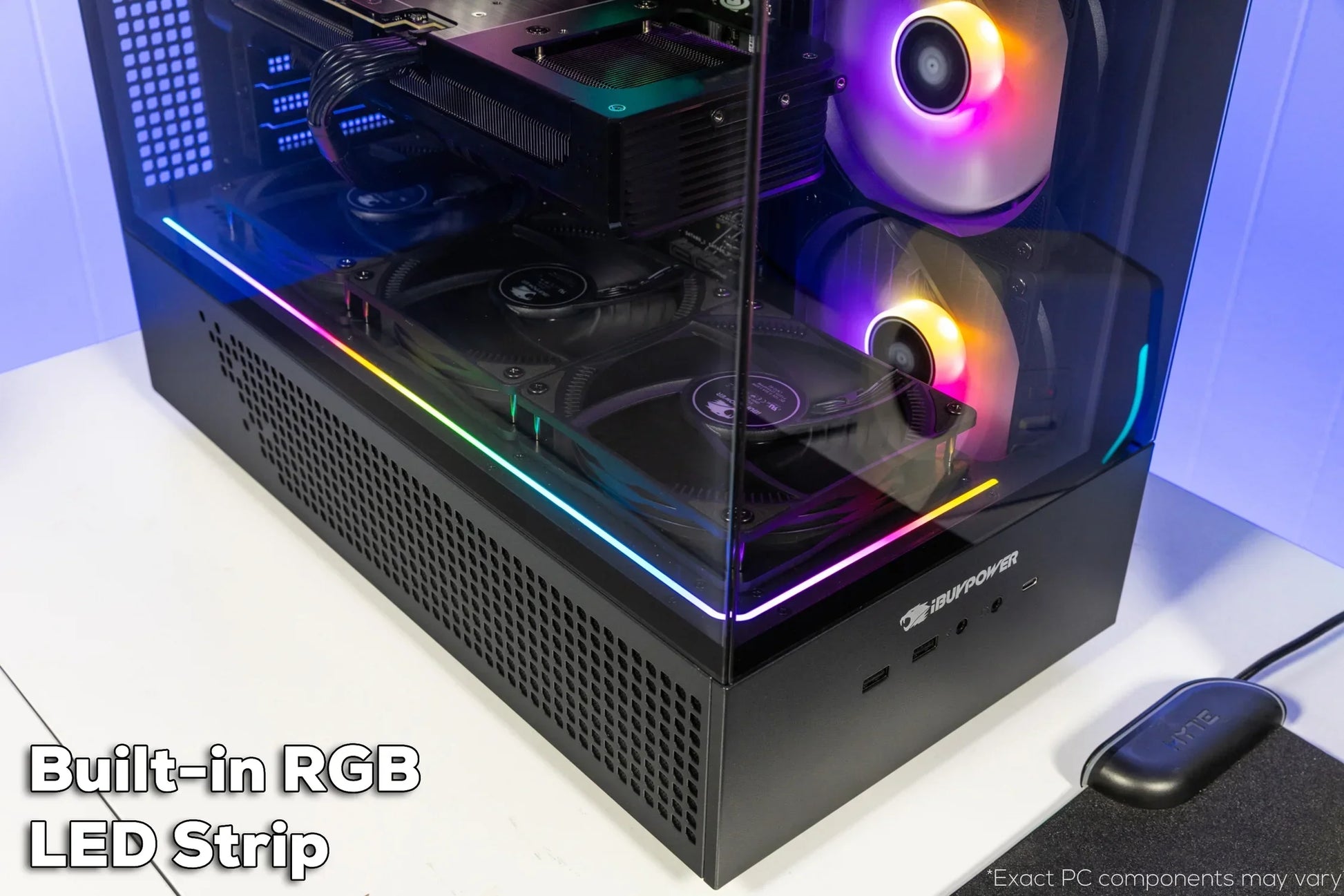 Close-up of iBUYPOWER gaming PC with RGB LED strip and dual RGB fans inside black case