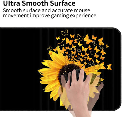 Gaming mouse on black mouse pad with bright sunflower and orange butterfly design showcasing smooth surface for accurate mouse movement
