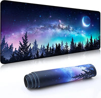 Large mouse pad with night sky, crescent moon, stars, and silhouetted pine trees design
