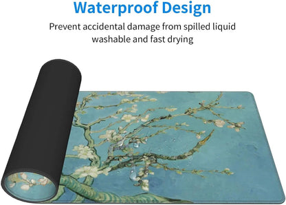 Rolled gaming mouse pad with waterproof design featuring almond blossom art and visible water droplets on surface