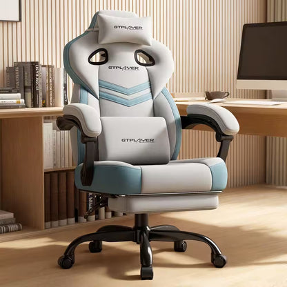 White and blue GTPLAYER gaming chair with lumbar support, headrest, and adjustable armrests in a modern desk setup