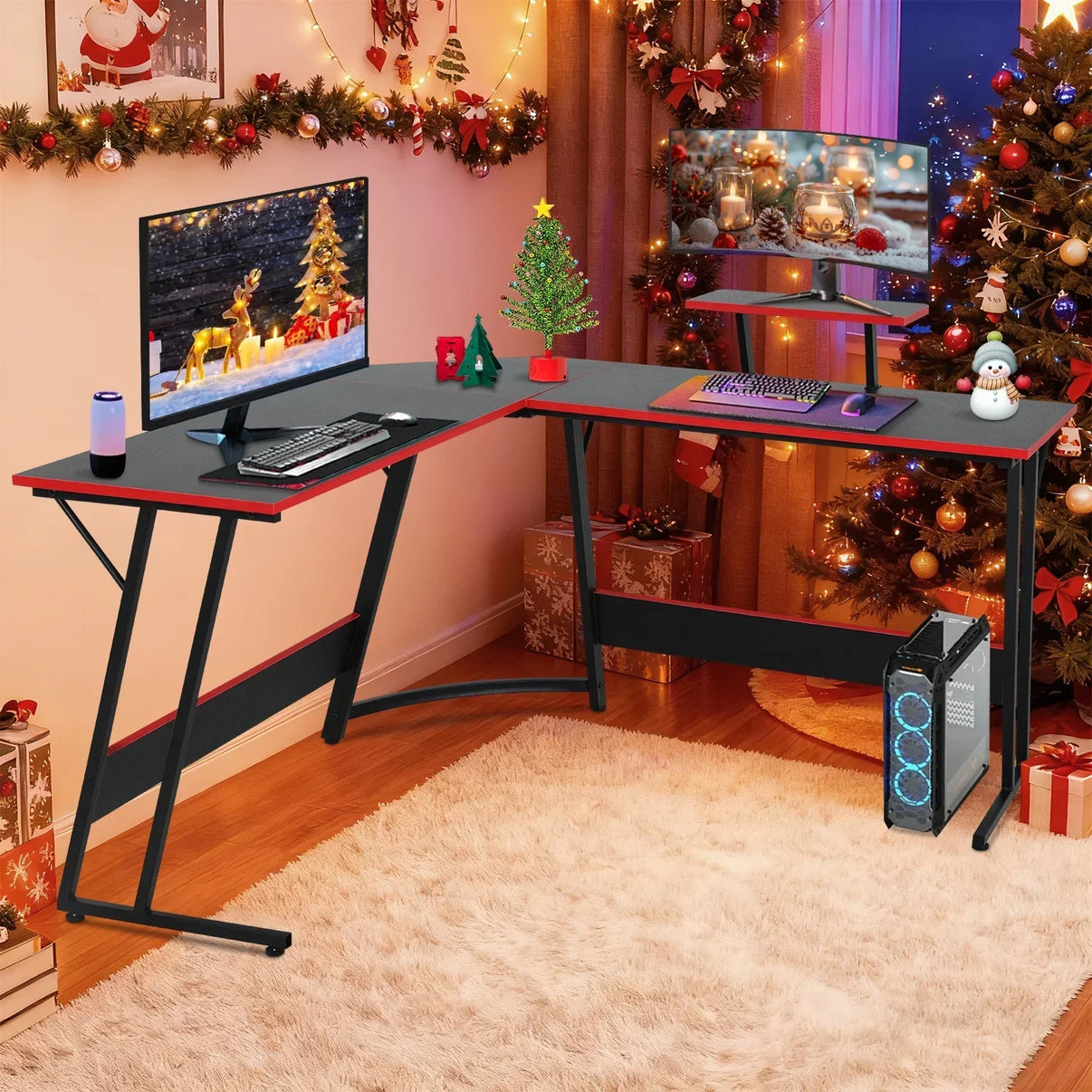L-shaped gaming desk setup with dual monitors, keyboard, gaming PC, and Christmas decorations