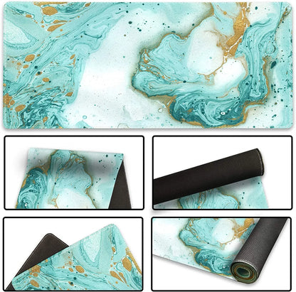 Gaming mouse pad with teal, white, and gold marble swirl design, stitched edge, and non-slip black backing