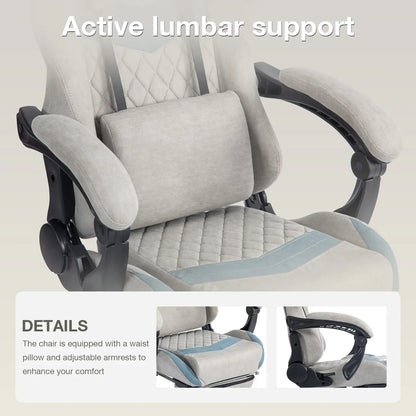 Gray ergonomic office chair with quilted seat, adjustable armrests, and lumbar support pillow
