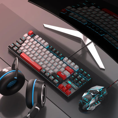 RGB gaming keyboard, mouse, and headset on desk, Byte Style retro 8-bit gaming setup