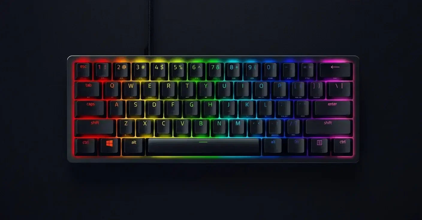 Mechanical keyboard with rainbow RGB backlighting on black background