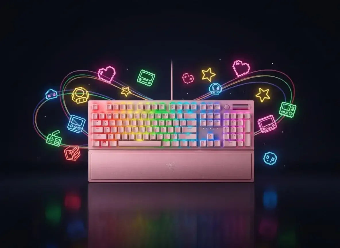 Pink mechanical keyboard with rainbow RGB lighting and neon retro gaming icons on black background