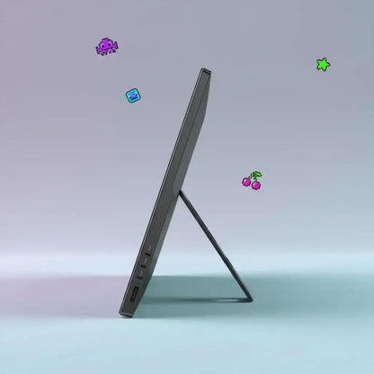 Side view of a sleek black tablet with kickstand on a light blue surface, pixel art icons floating
