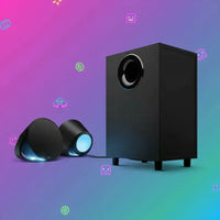Black compact speaker set with blue LED lights and a subwoofer on colorful gradient background with gaming icons