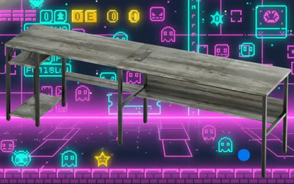Modern gray computer desk with shelves in front of neon retro video game background