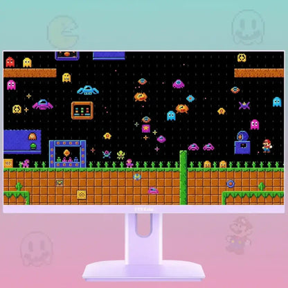 Monitor displaying retro pixel art video game with Pac-Man and Mario elements