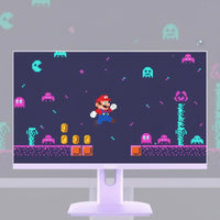 Pixel art gaming monitor displaying Mario jumping with coins and Pac-Man ghosts