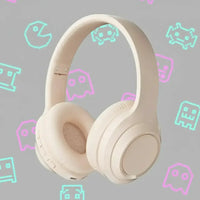 Beige wireless headphones with retro gaming icons on gray background