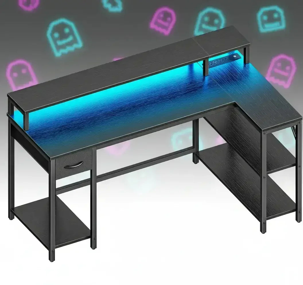 Modern L-shaped gaming desk with LED lighting, drawer, and open shelves, neon ghost backdrop
