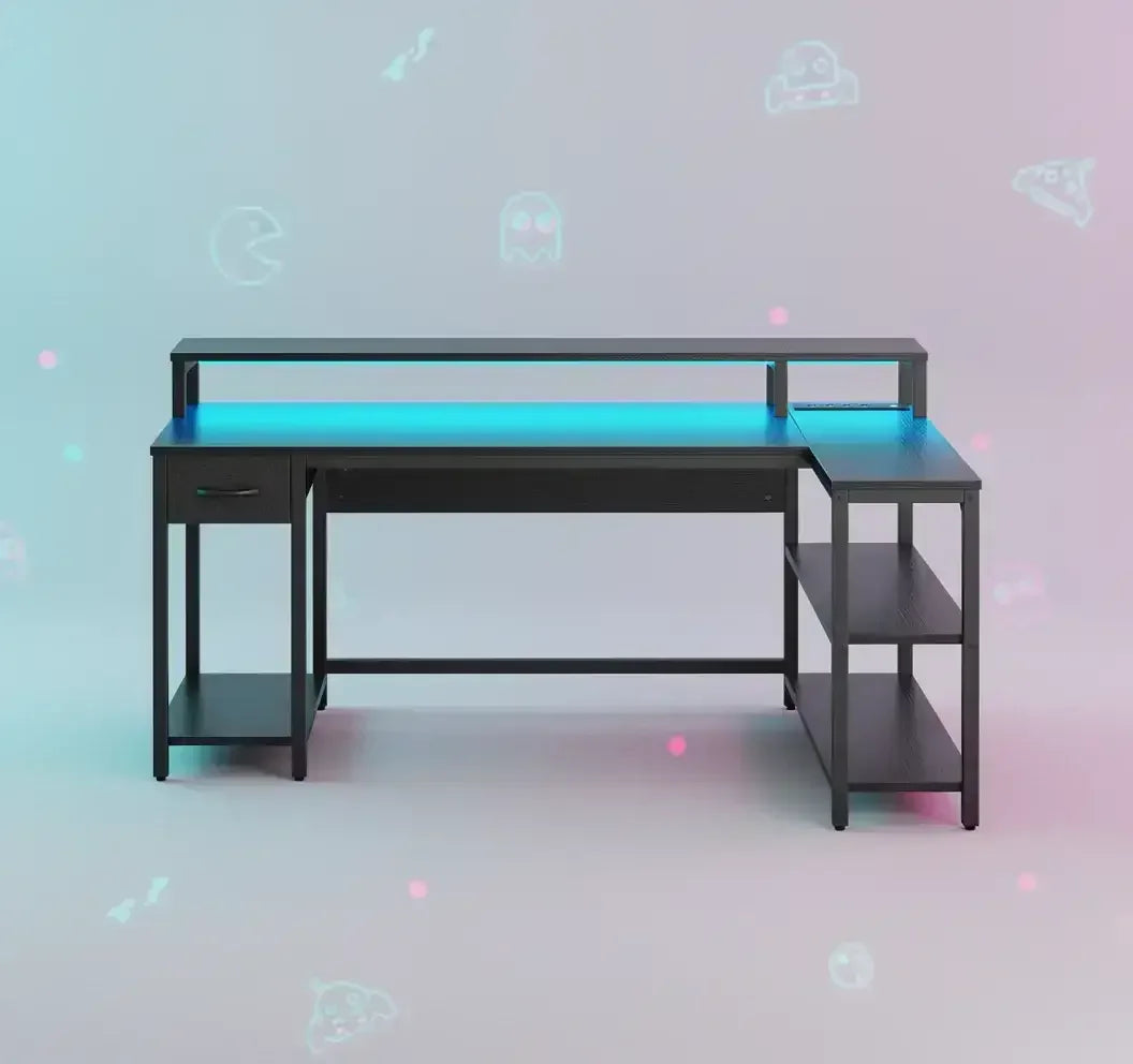 Modern L-shaped black gaming desk with blue LED light, open shelves, drawer, pastel gamer icons background