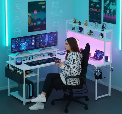 Young woman gaming at a dual-monitor setup with futuristic digital car and arm blueprints, neon-lit modern desk