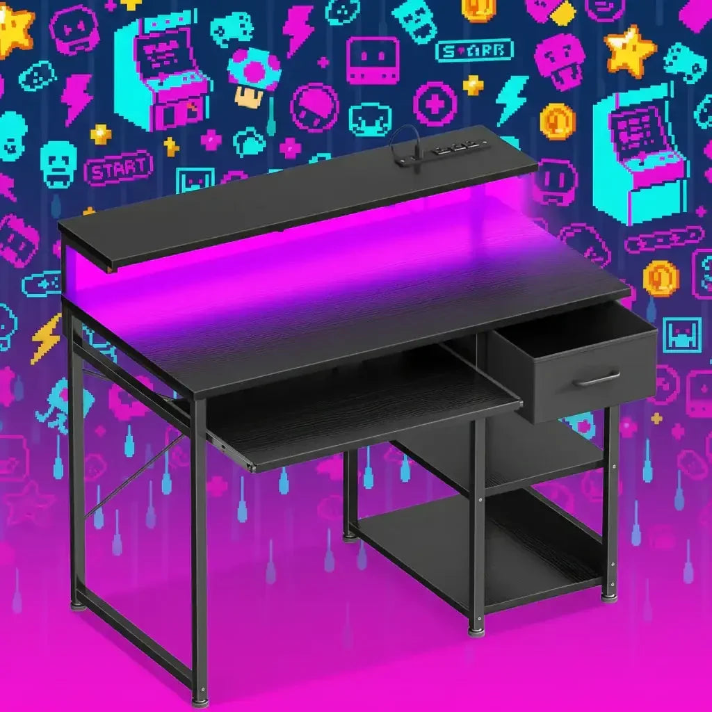 Black gaming desk with purple LED light strip, drawer, shelves, and pixel art gaming icons background