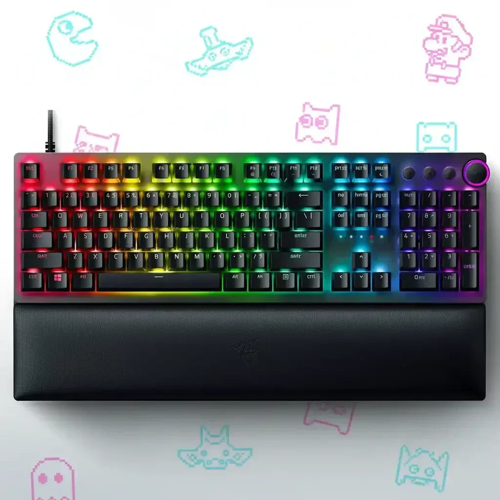RGB gaming keyboard with wrist rest on white background, retro video game icons, vibrant lighting