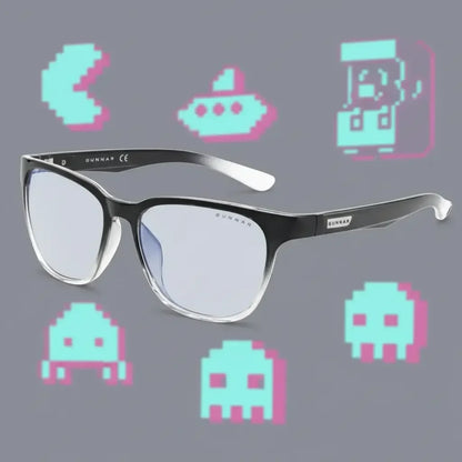 Black and transparent Gunnar gaming glasses with pixelated retro video game icons on gray background