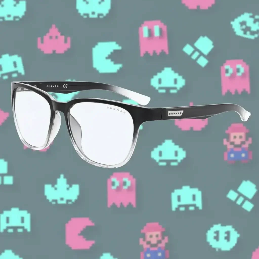 Semi-transparent black and gray Gunnar gaming glasses with pixel art video game characters background