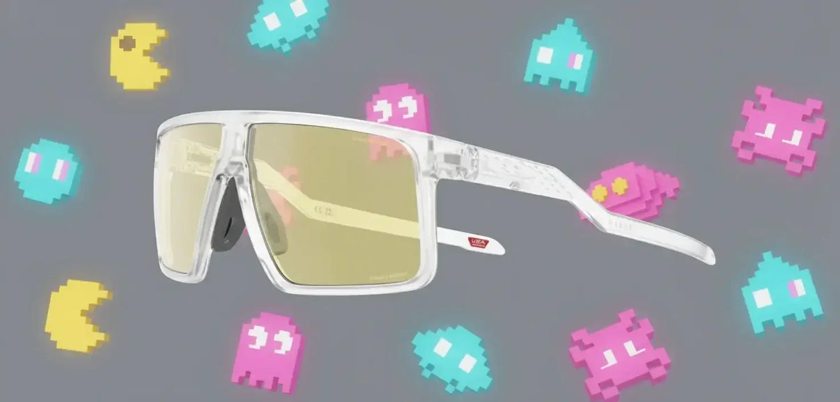 Transparent yellow-lens sunglasses with pixel art gaming icons on a grey background