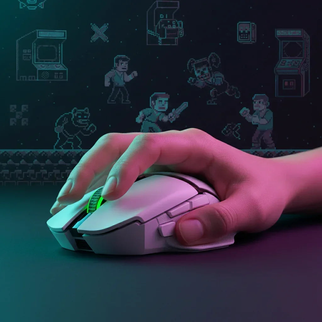Hand using a white gaming mouse with RGB lighting and retro arcade game pixel art background