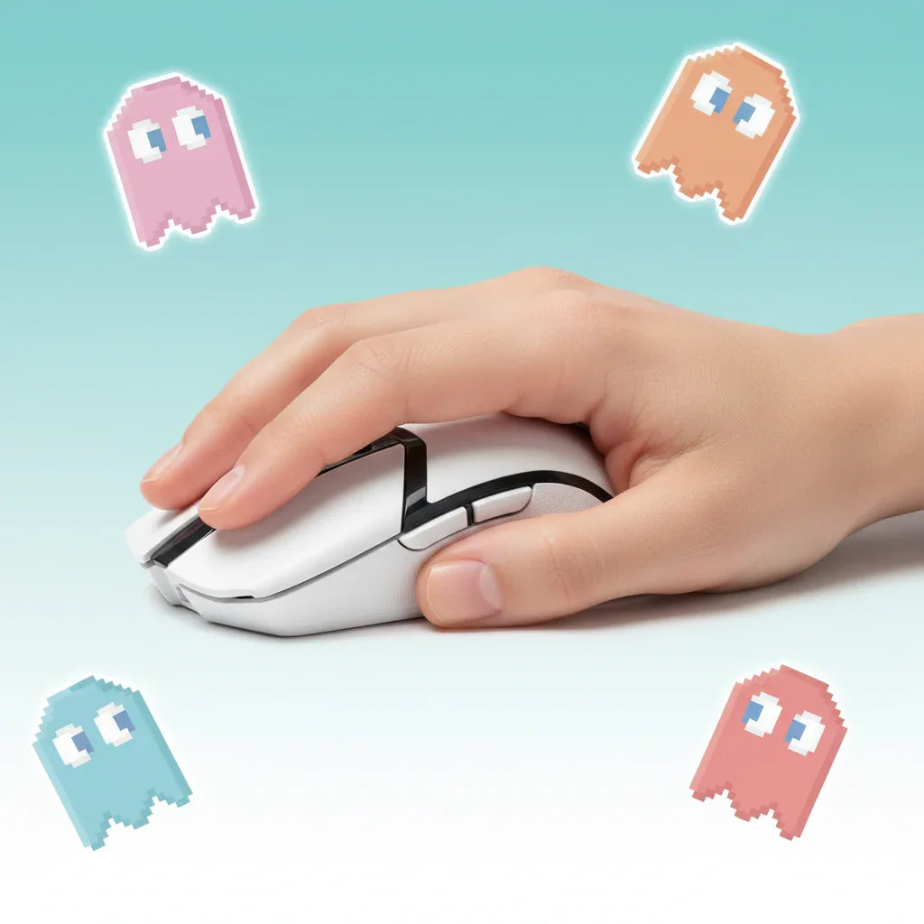 Hand using a white gaming mouse with pastel retro pixel ghosts on blue background
