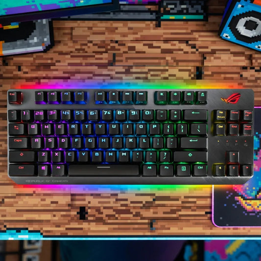 RGB mechanical gaming keyboard on a pixel art desk with retro gaming decor
