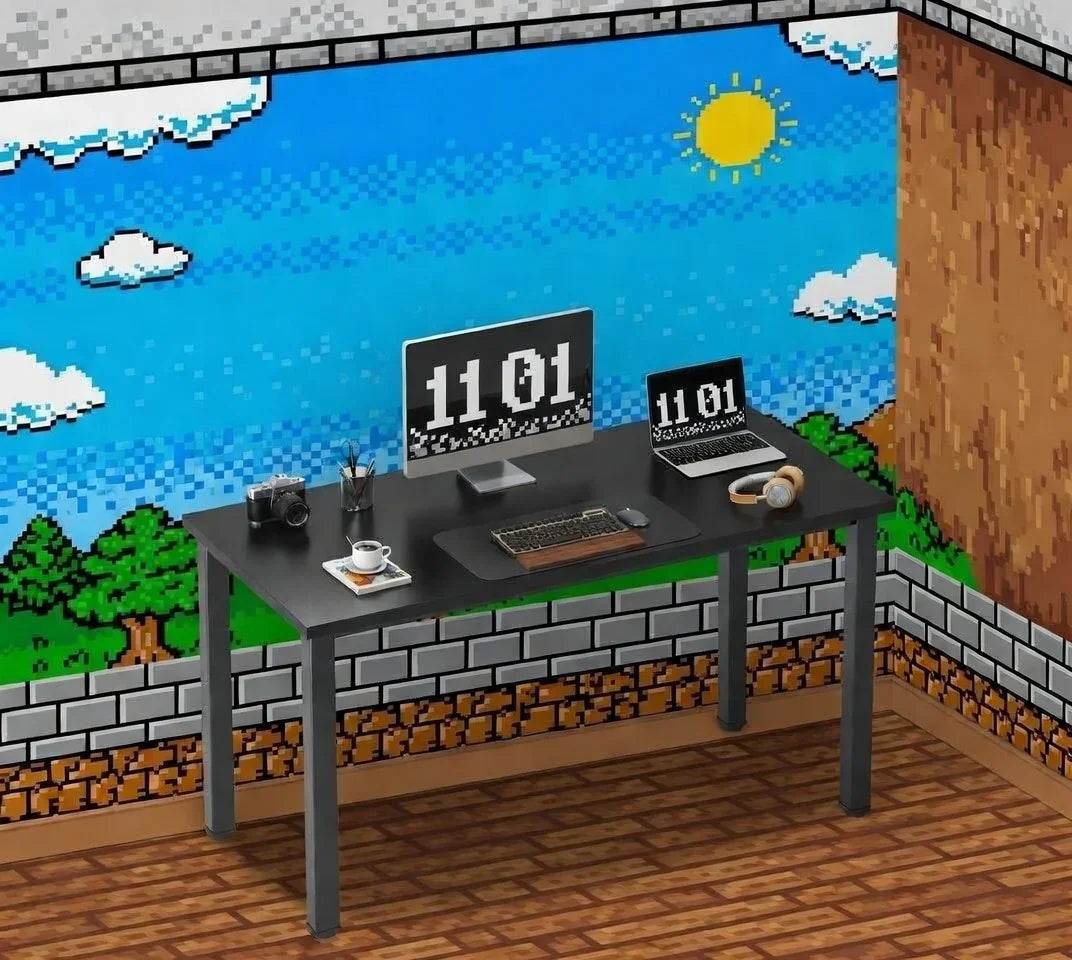 Retro gaming desk setup with 8-bit pixel art wallpaper, keyboard, monitor, laptop, and headphones.
