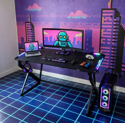 Retro 8-bit gaming setup with RGB keyboard, mouse, headset, PC, and pixel art robot