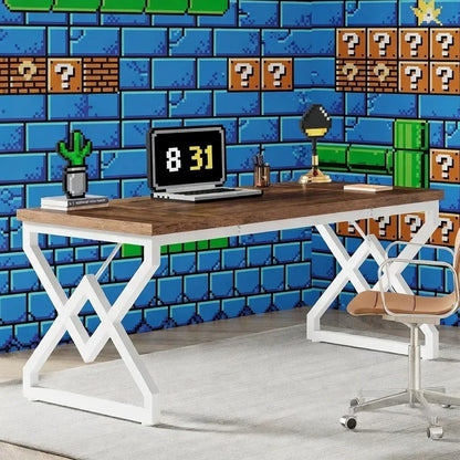 Gaming desk setup with wood top, white frame, pixel art decor, and retro 8-bit wall mural.