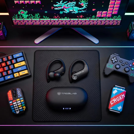 Retro gaming setup with 8-bit style keyboard, mouse, controller, and wireless earbuds on RGB desk.