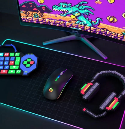 Retro gaming setup with RGB mouse, pixel art keyboard, headset, and 8-bit game on monitor