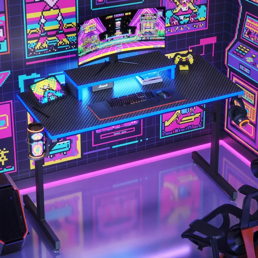 Retro gaming setup with RGB-lit desk, mechanical keyboard, gaming mouse, curved monitor, and 8-bit pixel art decor.
