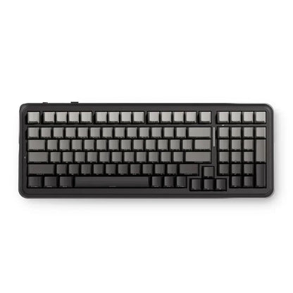 Black full-size gaming keyboard with gray keycaps, ideal for PC setup and retro 8-bit style